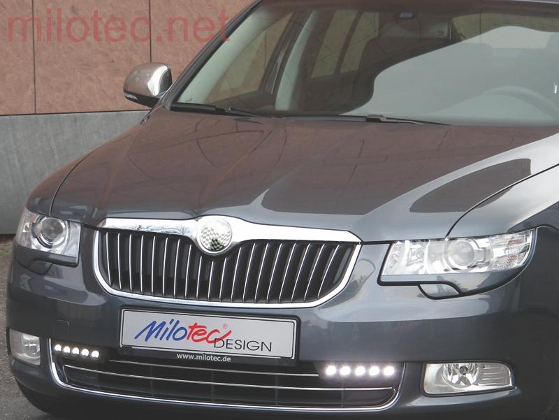 Kryty světlometů (mračítka), ABS černý - Škoda Superb II.