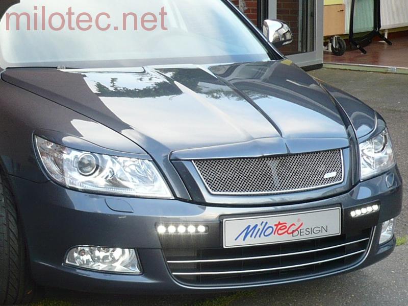 Kryty světlometů (mračítka) "RS", černý lesklý "klavírlak" - Škoda Octavia II. Facelift